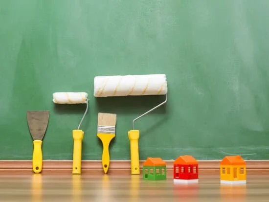 Close-up of A & H Home Improvement logo on white background